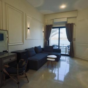 Spacious Deluxe Twin Room with modern amenities at NileCastle Hotel